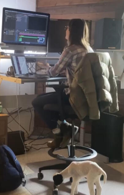 Editing The Bigget Little Farm in barn office with lamb